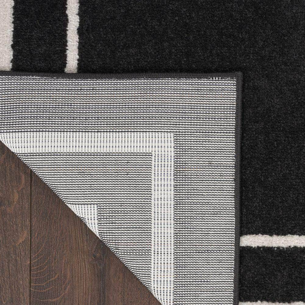 Nourison Essentials NRE02 Black Ivory Rugs #color_black ivory