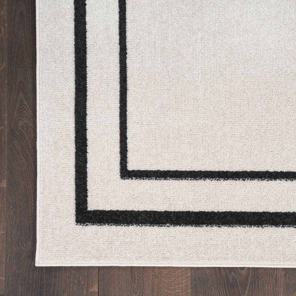 Nourison Essentials NRE02 Ivory Black Rugs #color_ivory black