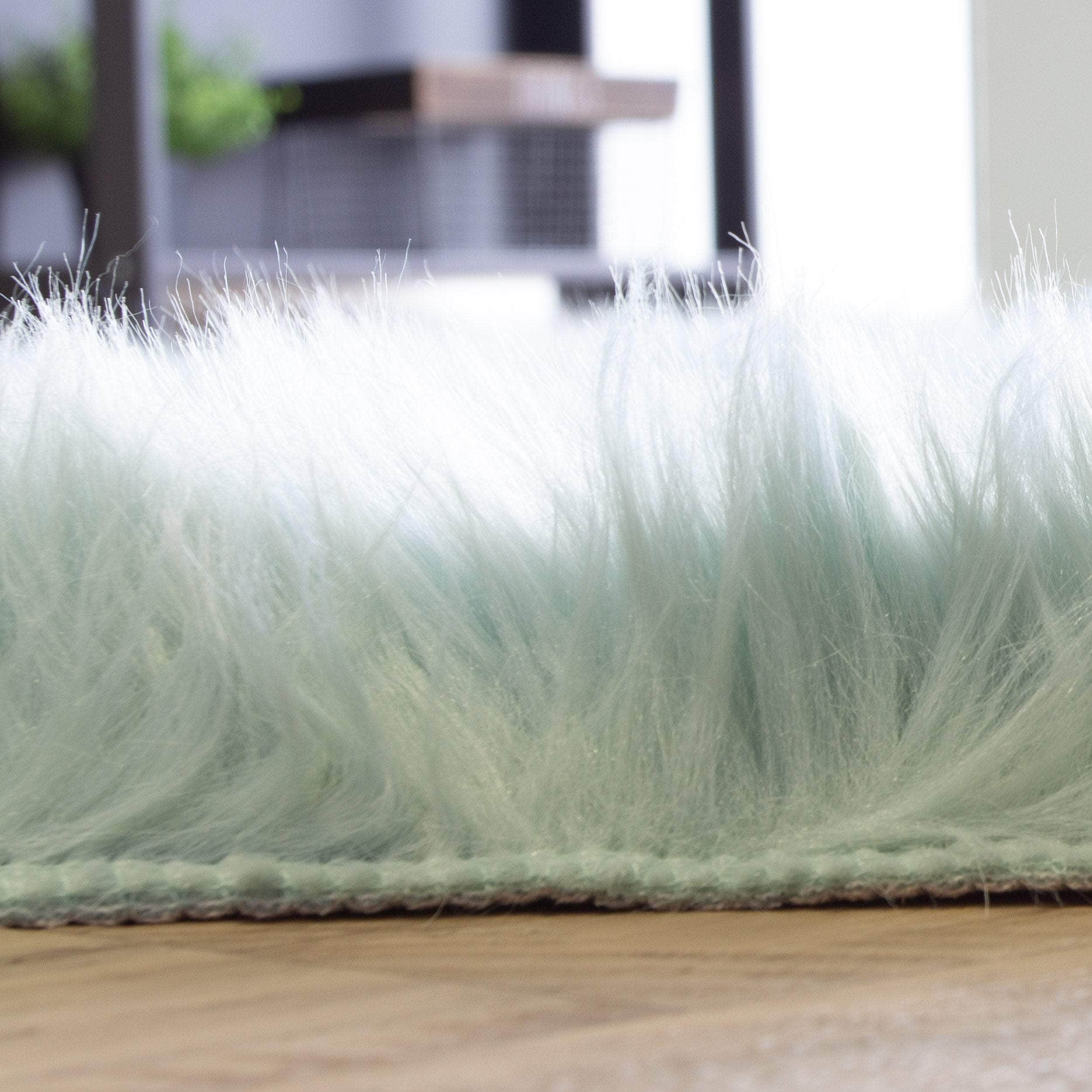 Soft Faux Sheepskin Fur Fluffy Area Rug in Teal #color_teal